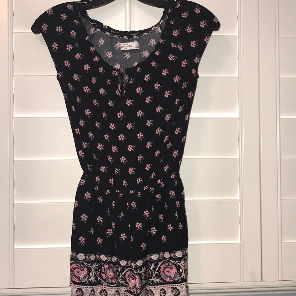 Black romper with pink and white flower patterning